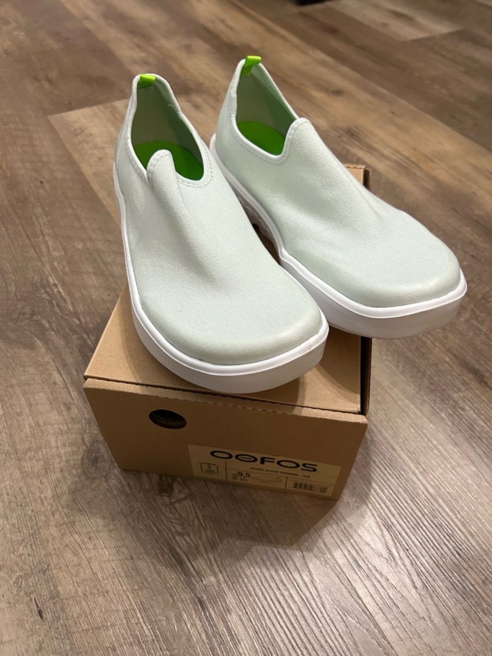 OOFOS Women's Slip-On Mules in Light Mint with Neon Green Accents